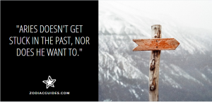 a rustic wooden arrow with a mountaintop background and a quote abour aries men and the past